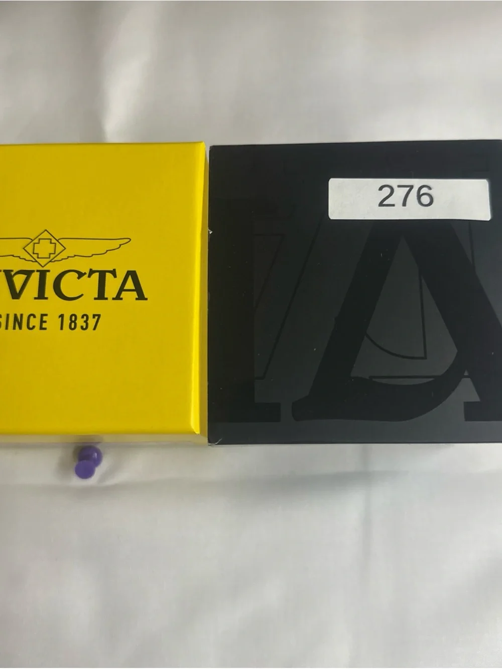 (276) Invicta White and Orange Sport Watch